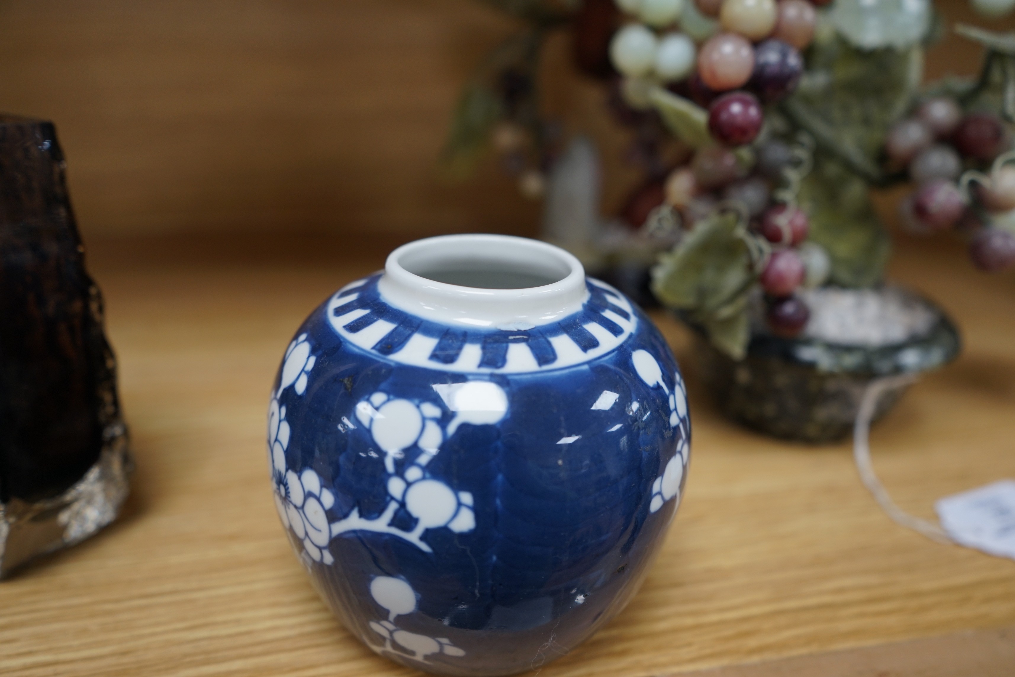 A group of Chinese blue and white prunus vases and jars and covers and jars, pair of vases 23 cms high